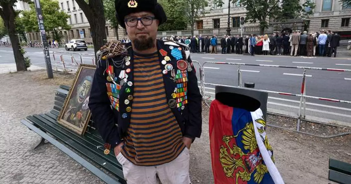 A Russian artist who was critical of Putin is killed near his home in Poland