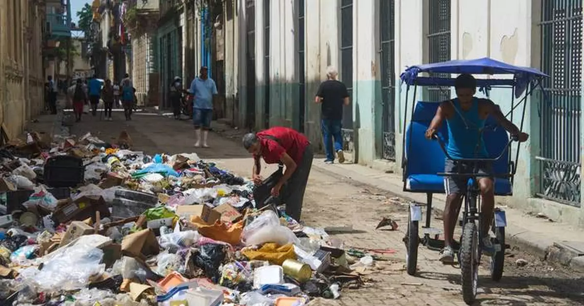 A garbage crisis engulfs Havana as fuel shortages stall trash pickup