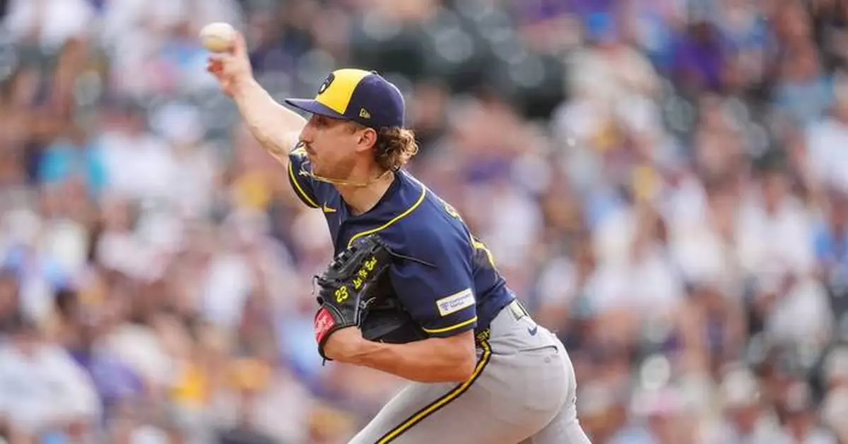 Brewers score 8 late runs, stun Rockies 9-7 in wild 10-inning victory