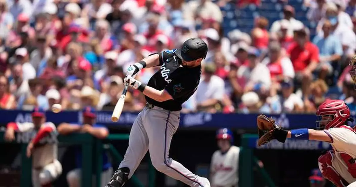 Liam Hicks removed from Marlins' lineup vs. Giants because of back tightness