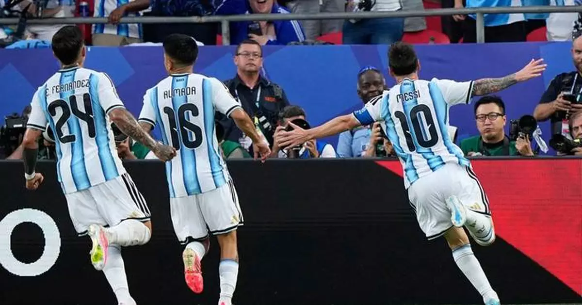 Lionel Messi ties the World Cup goals record with an incredible hat trick as Argentina tops Algeria