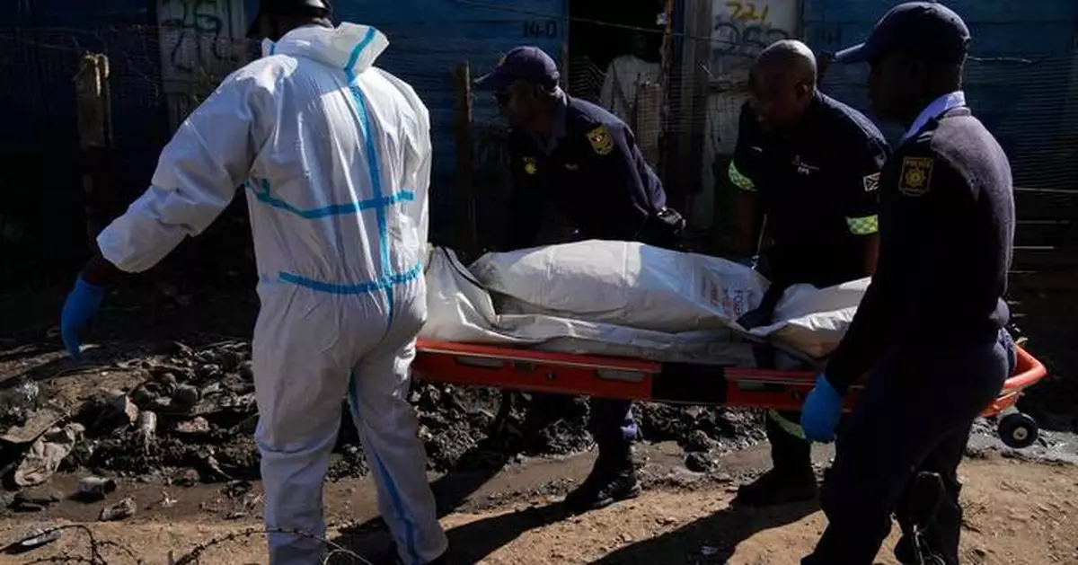 Multiple attackers kill 12 people and wound 9 in a late-night shooting in South Africa