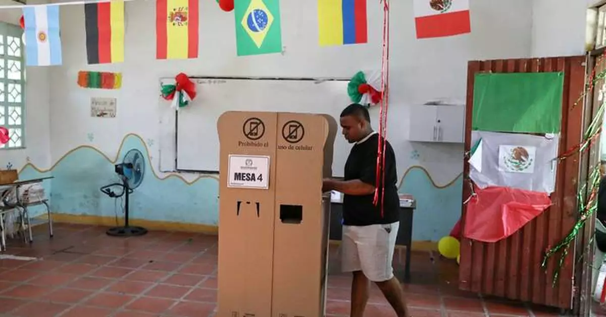 Colombians choose between an outsider and a progressive in a presidential runoff election, in photos