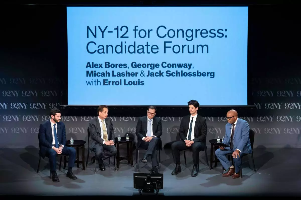 FILE - From left, Alex Bores, George Conway, Micah Lasher, and Jack Schlossberg, democratic candidates in New York's 12th Congressional District, and Errol Louis attend "NY-12 for Congress: Candidate Forum" at 92NY, on April 15, 2026, in New York. (AP Photo/Yuki Iwamura, File)