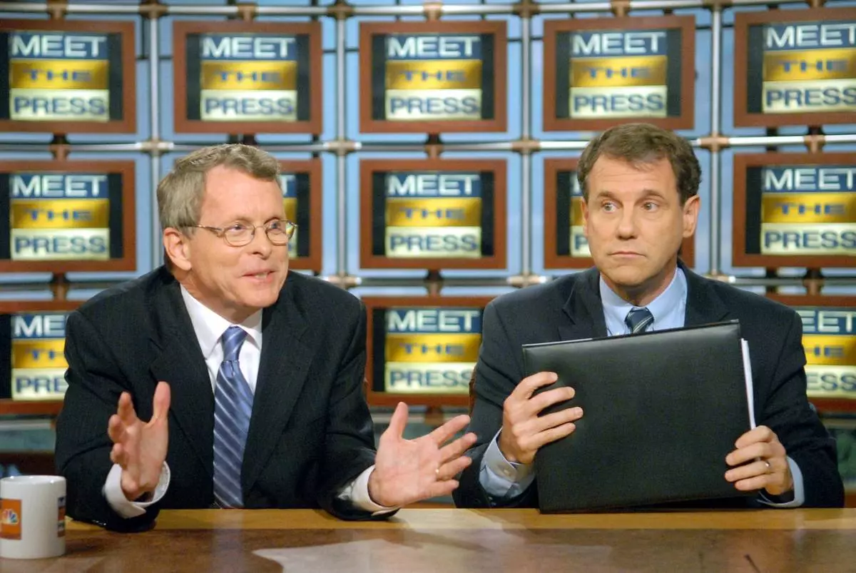 FILE - Sen. Mike DeWine, R-Ohio, left, debates his challenger Rep. Sherrod Brown, D-Ohio, on NBC's 'Meet the Press' Oct. 1, 2006, in Washington. (AP Photo/Kevin Wolf, File)