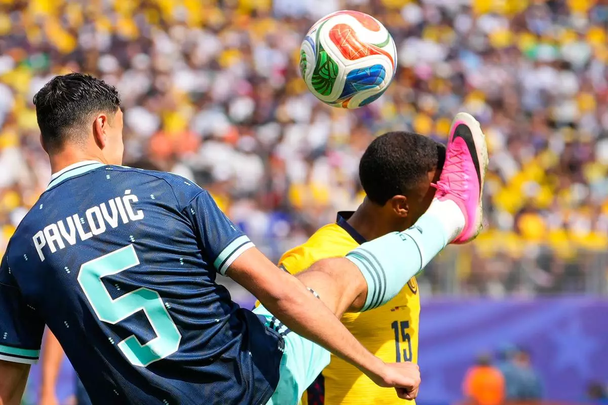 Germany's Aleksandar Pavlovic (5) and Ecuador's Pedro Vite battle for the ball during the World Cup Group E soccer match in East Rutherford, N.J., near New York, Thursday, June 25, 2026. (AP Photo/Yuki Iwamura)