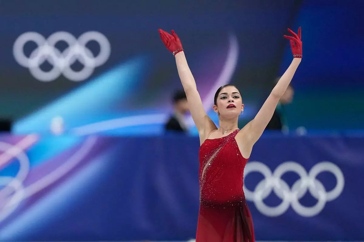 FILE - Adeliia Petrosian of Individual Neutral Athletes competes during the women's figure skating free program at the 2026 Winter Olympics, in Milan, Italy, on Feb. 19, 2026. (AP Photo/Natacha Pisarenko, File)