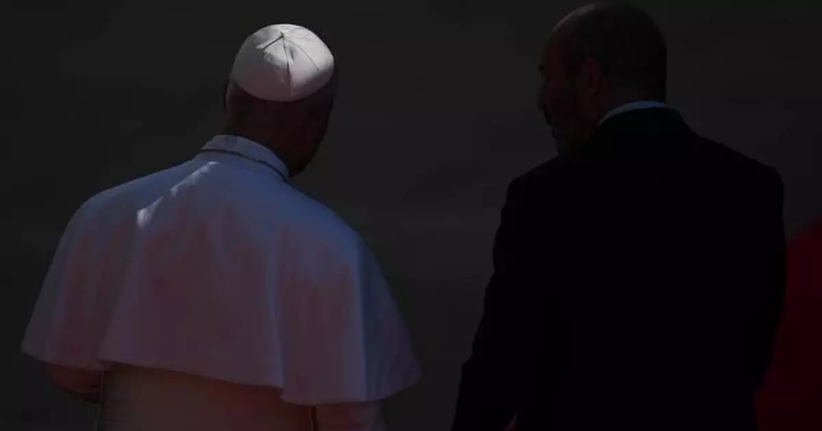 Pope's historic speech to Spain's parliament demands respect for migrants and gets 7-minute ovation