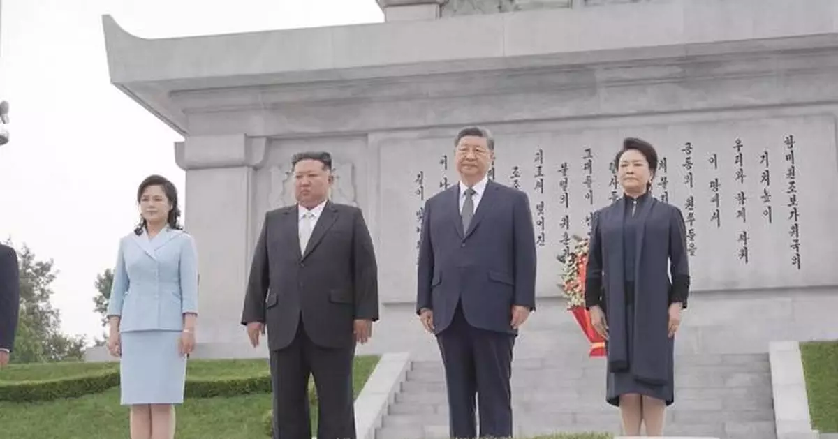 Xi, Kim pledge to carry forward great traditional China-DPRK friendship through generations