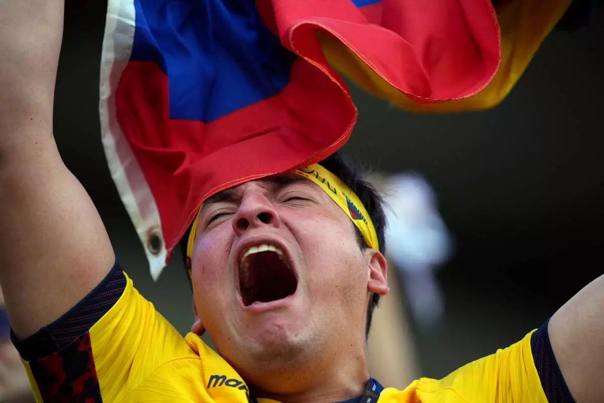An Ecuador fan cheers before the World Cup Group E soccer match between Ivory Coast and Ecuador in Philadelphia, Sunday, June 14, 2026. (AP Photo/Matt Rourke)
