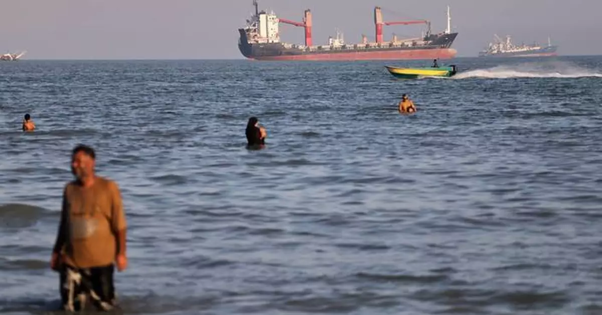 An oil tanker navigates the Strait of Hormuz despite threats from Iran's Revolutionary Guard