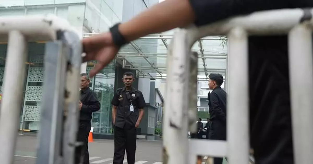 Investigators search Indonesian free meals agency after its leader was fired