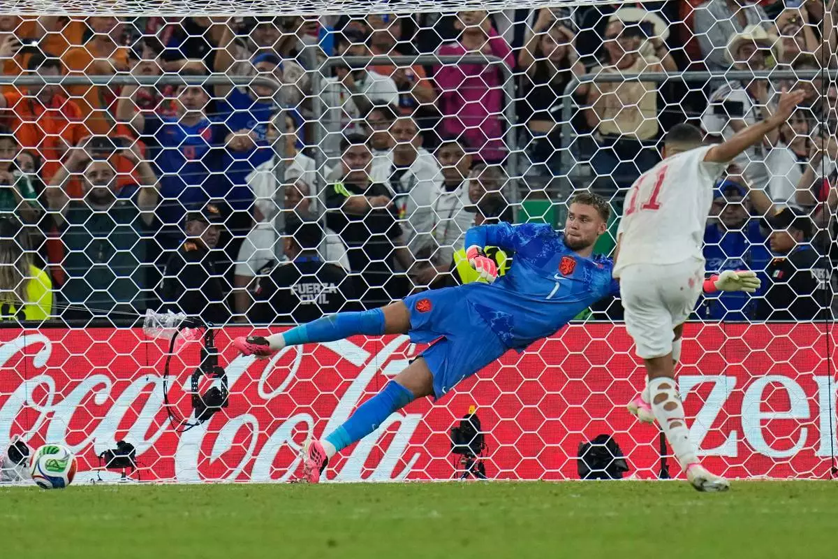 Morocco's Ismael Saibari (11) scores from the penalty spot during the World Cup round of 32 soccer match between the Netherlands and Morocco in Guadalupe, near Monterrey, Mexico, Monday, June 29, 2026. (AP Photo/Ricardo Mazalan)