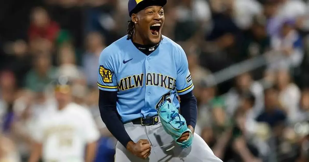 Brewers outlast A's 15-14 in 12 innings as teams combine for 11 homers and 34 hits in Las Vegas