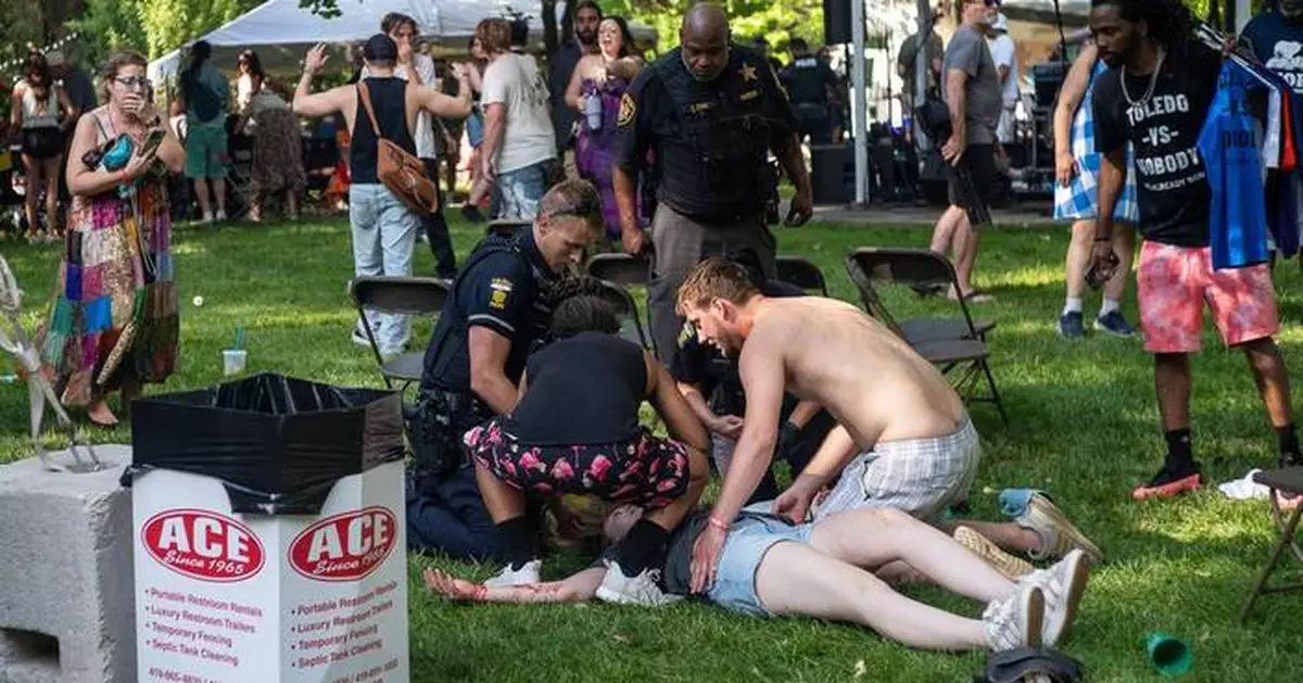 Police zero in on 2 suspects after a mass shooting at a festival in Toledo, Ohio
