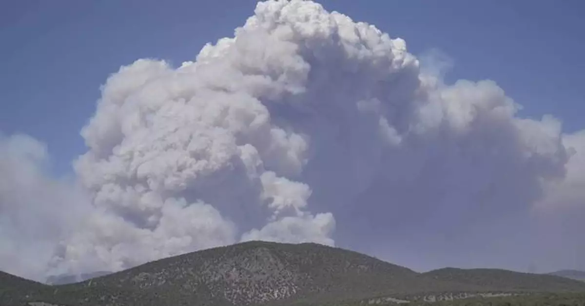 Dangerous weather hampers firefighters and leads to fireworks bans in western US