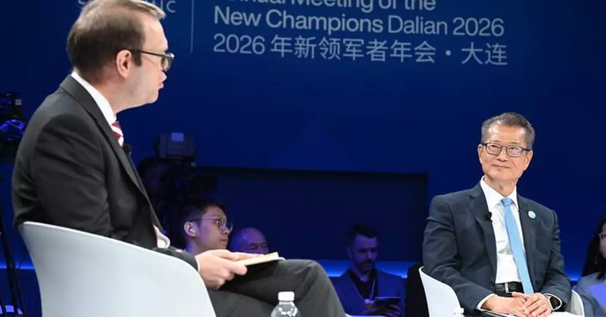 Paul Chan Engages in Economic Discussions at Summer Davos, Promotes Hong Kong's Financial Opportunities in Liaoning