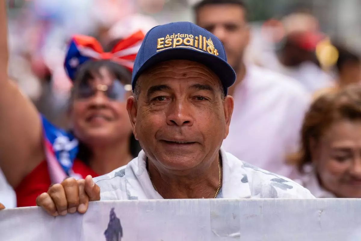 Rep. Adriano Espaillat, D-N.Y., takes part in the National Puerto Rican Day Parade, Sunday, June 14, 2026 in New York. (AP Photo/Adam Gray)