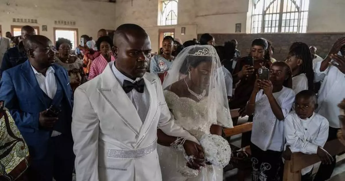 Celebrating a wedding amid the Ebola outbreak: No kisses or close contact, but love lives here