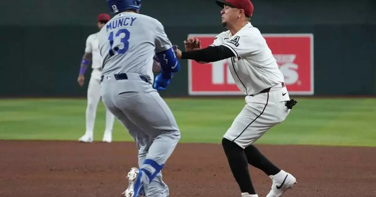 Ketel Marte hits solo homer in 9th, Diamondbacks rally after scary collision to beat Dodgers 3-2