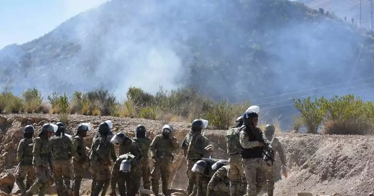 Bolivia clears anti-government roadblocks after emergency decree, as patrol plane crash kills 6