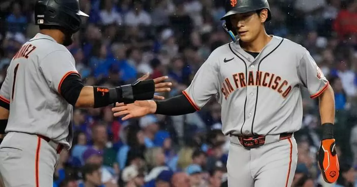 Chapman’s 10th-inning single gives the Giants a 2-1 win over the Cubs