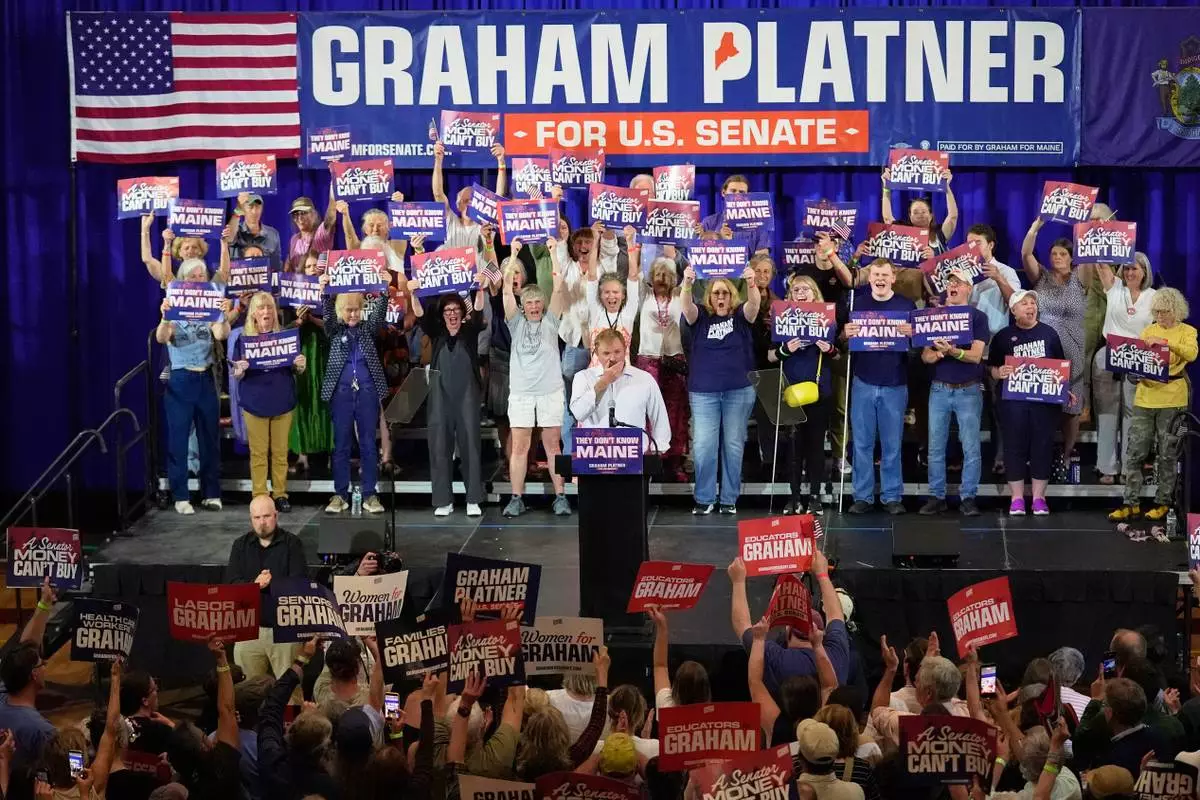 Democratic U.S. Senate candidate Graham Platner stands on stage during a primary election night watch party after winning the Democratic nomination Tuesday, June 9, 2026, in Blue Hill, Maine. (AP Photo/Robert F. Bukaty)