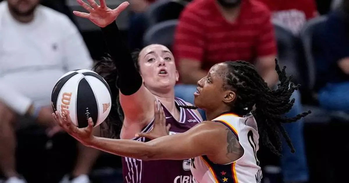 Mitchell scores 27, Clark has 21 points and 14 assists, and the Fever beat the Tempo 113-91