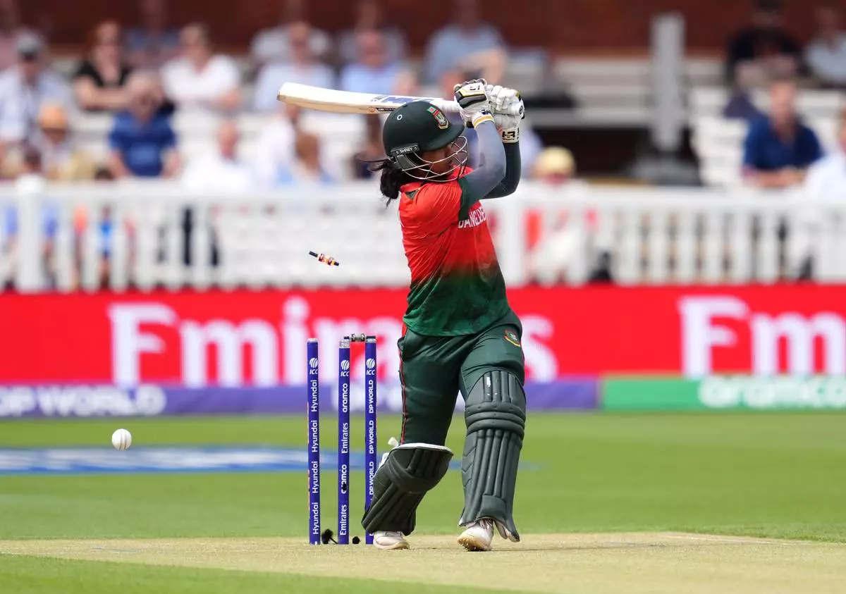 Bangladesh's Juairiya Ferdous is bowled out by South Africa's Marizanne Kapp during the Women's T20 World Cup cricket match between Bangladesh and South Africa at Lord's Cricket Ground, in London, Sunday June 28, 2026. (Adam Davy/PA via AP)