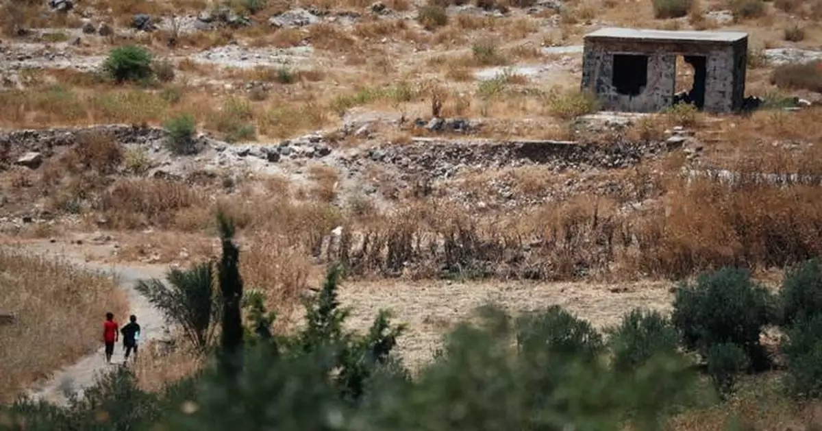 Israeli troops face resistance from residents as they push into a town in Syria