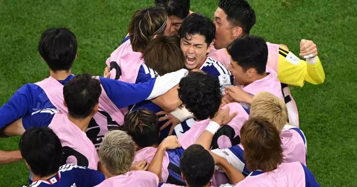 Daichi Kamada's late header gives Japan a 2-2 draw with the Netherlands in World Cup opener for both