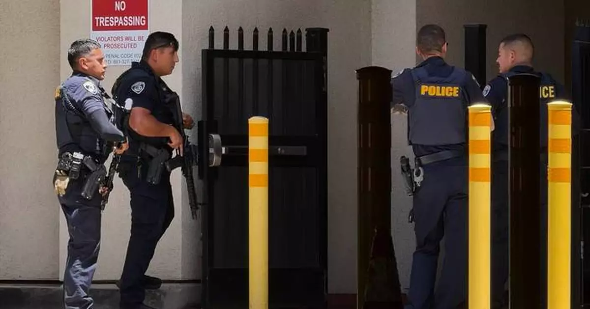 Police say man barricaded himself inside bank building with others in California city of Bakersfield