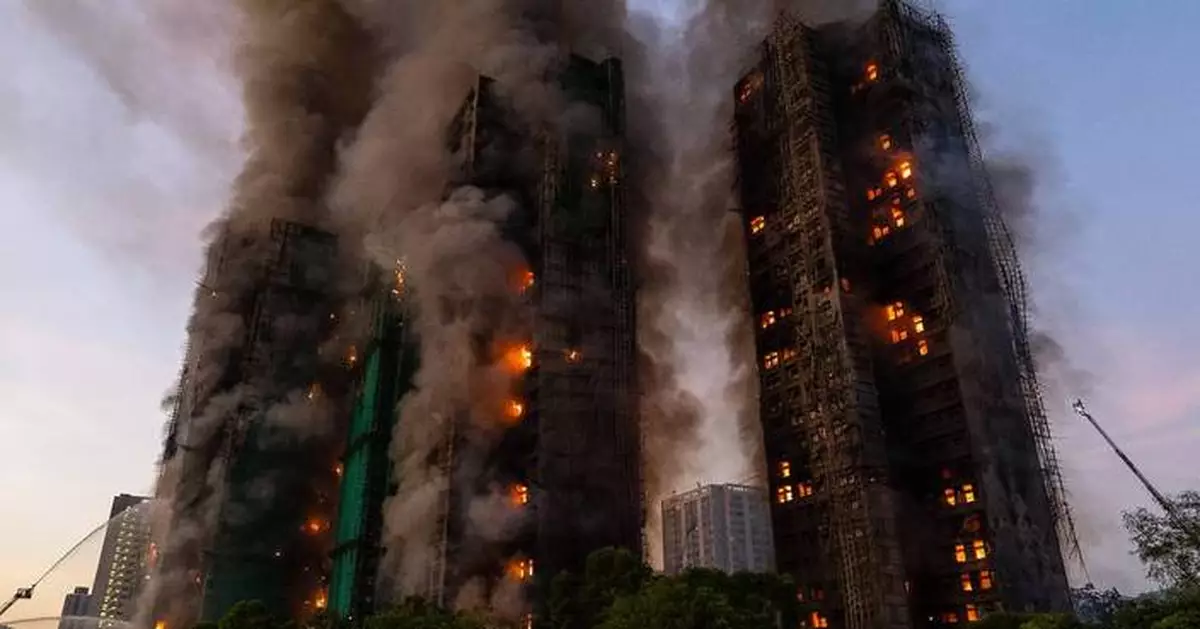 Hong Kong charges 7 people and 2 firms over massive fire that killed 168