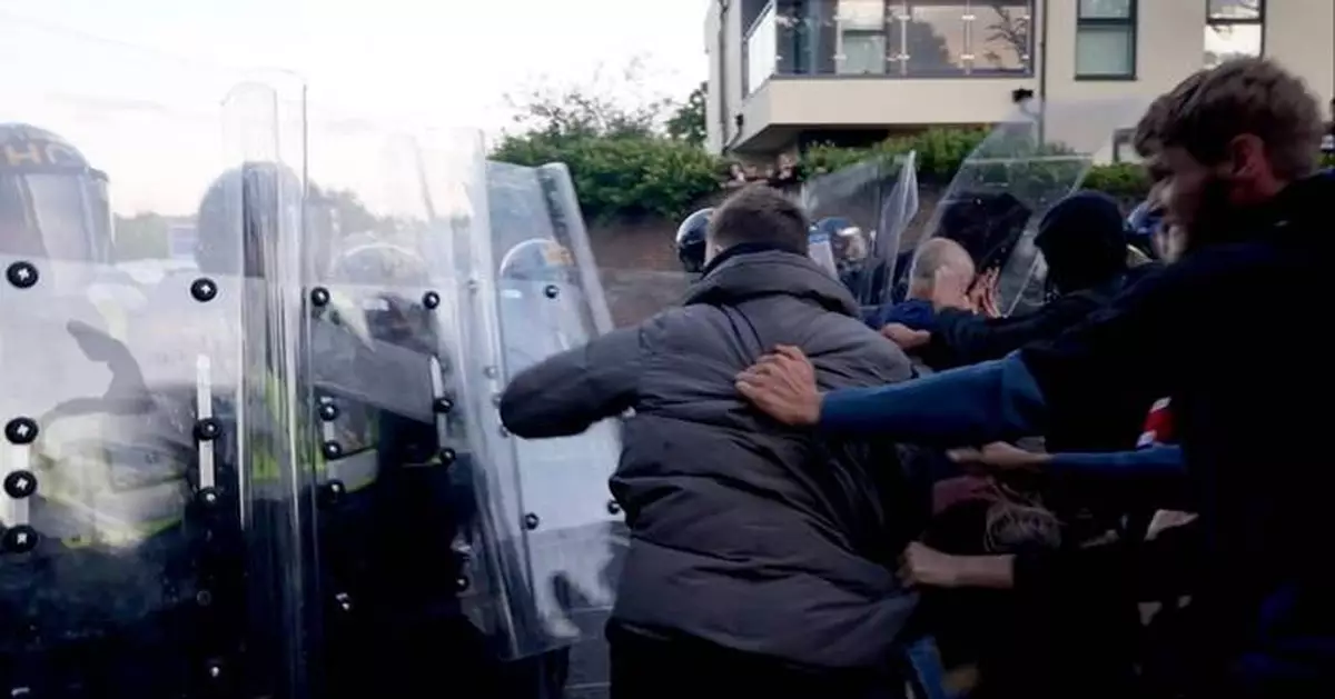 UK police charge 6 more with violent disorder at protest over teen's stabbing death