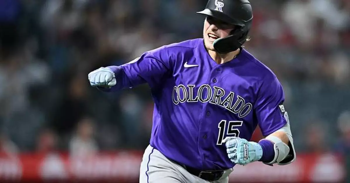 Goodman's 3-run homer and Rumfield's sac fly help Rockies rally for 9-8 win over Angels