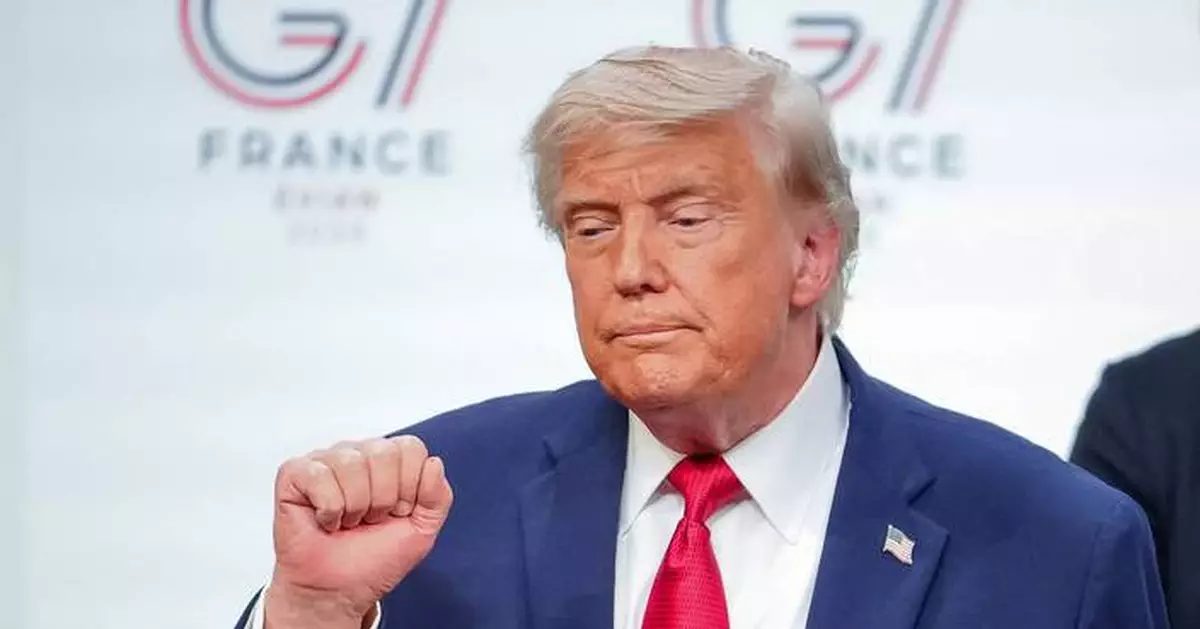 The Latest: Trump pushes back against critics of Iran deal