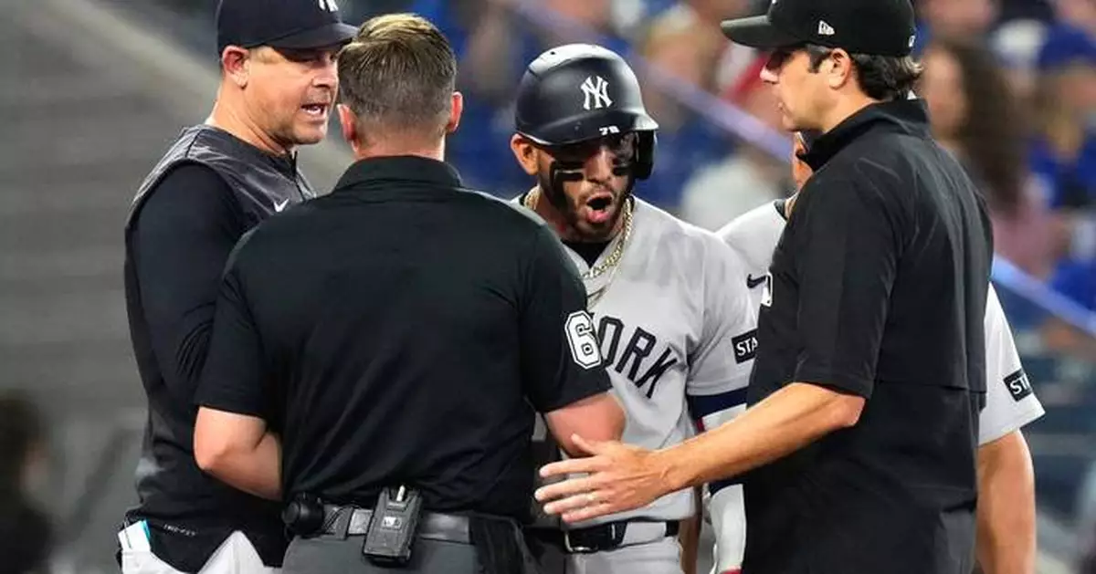 Yankees manager Aaron Boone speaks to MLB about José Caballero's delay-of-game warning