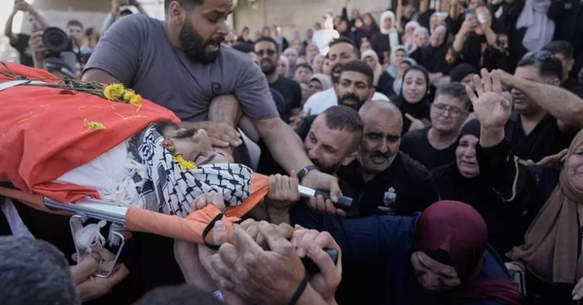 Palestinian man is shot and killed at a West Bank barrier near Jerusalem