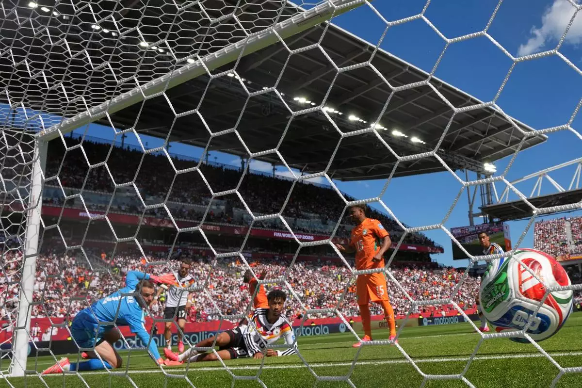 Ivory Coast's Franck Kessie (8) scores their opening goal during the World Cup Group E soccer match between Germany and Ivory Coast in Toronto, Canada, Saturday, June 20, 2026. (AP Photo/Stephanie Scarbrough)