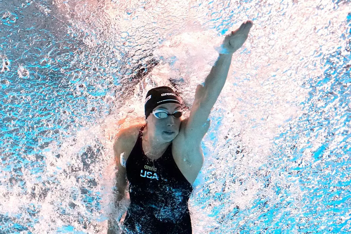 FILE - Gretchen Walsh, of the United States, competes in the women's 50-meter freestyle final at the World Aquatics Championships in Singapore, Aug. 3, 2025. (AP Photo/Lee Jin-man, File)