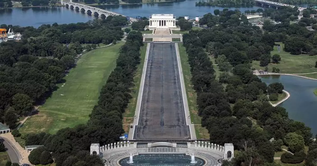 Drained Reflecting Pool reveals Trump's 'American flag blue' liner is now closer to gray