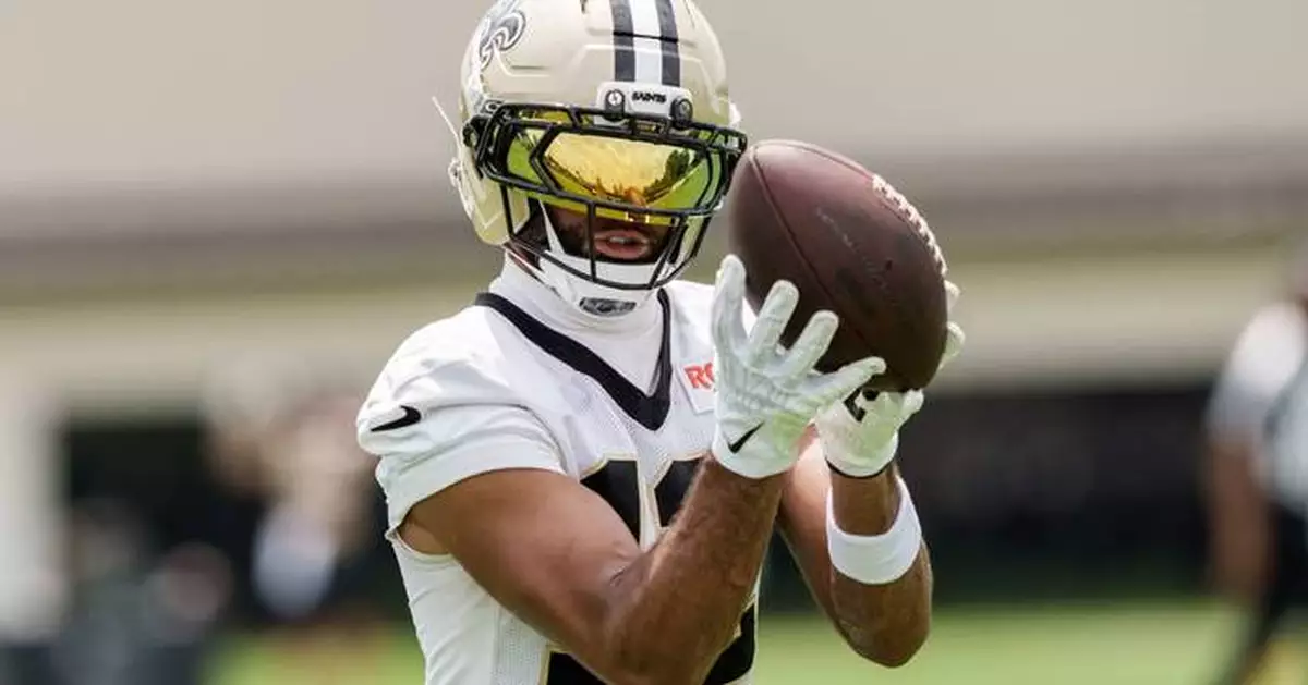 Saints GM Mickey Loomis: receiver Chirs Olave reports for camp as contract negotiations continue