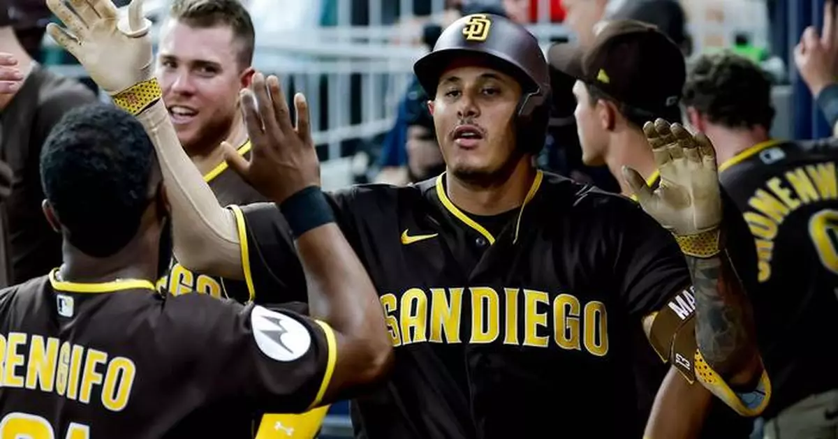 Machado homers twice, Tatis hits longest homer of season to lead Padres to 8-3 win over Braves