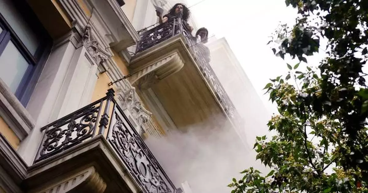 Greek police arrest 2 people over 2010 fatal arson attack on Athens bank