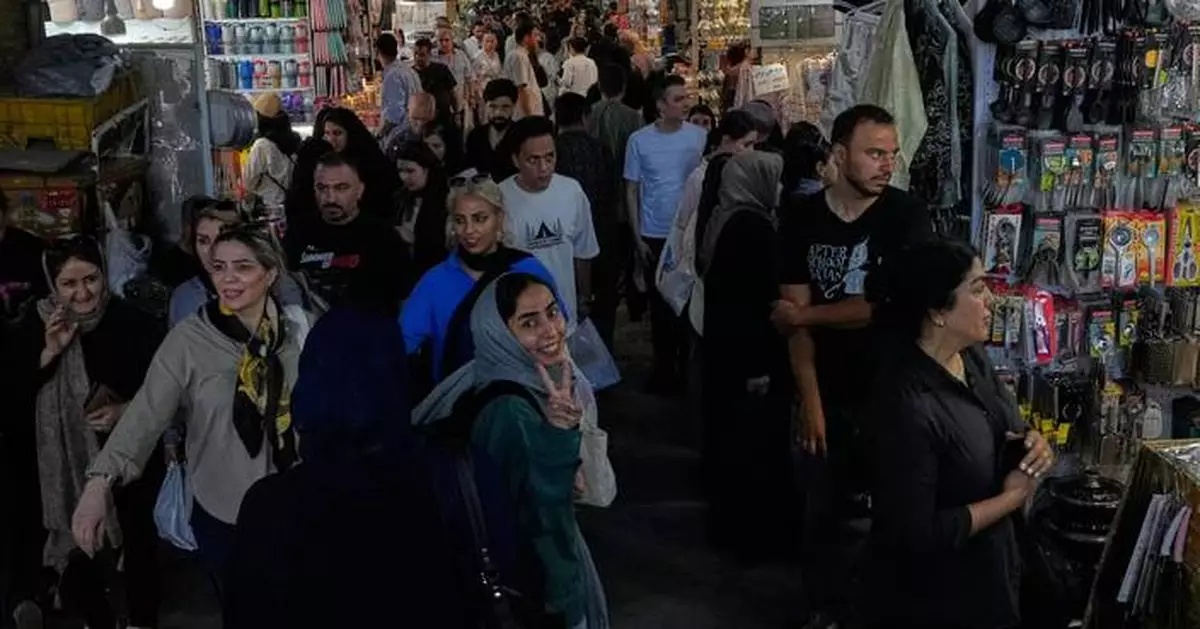 US strikes bridges and collapses a tower at a key port as its Iran campaign expands