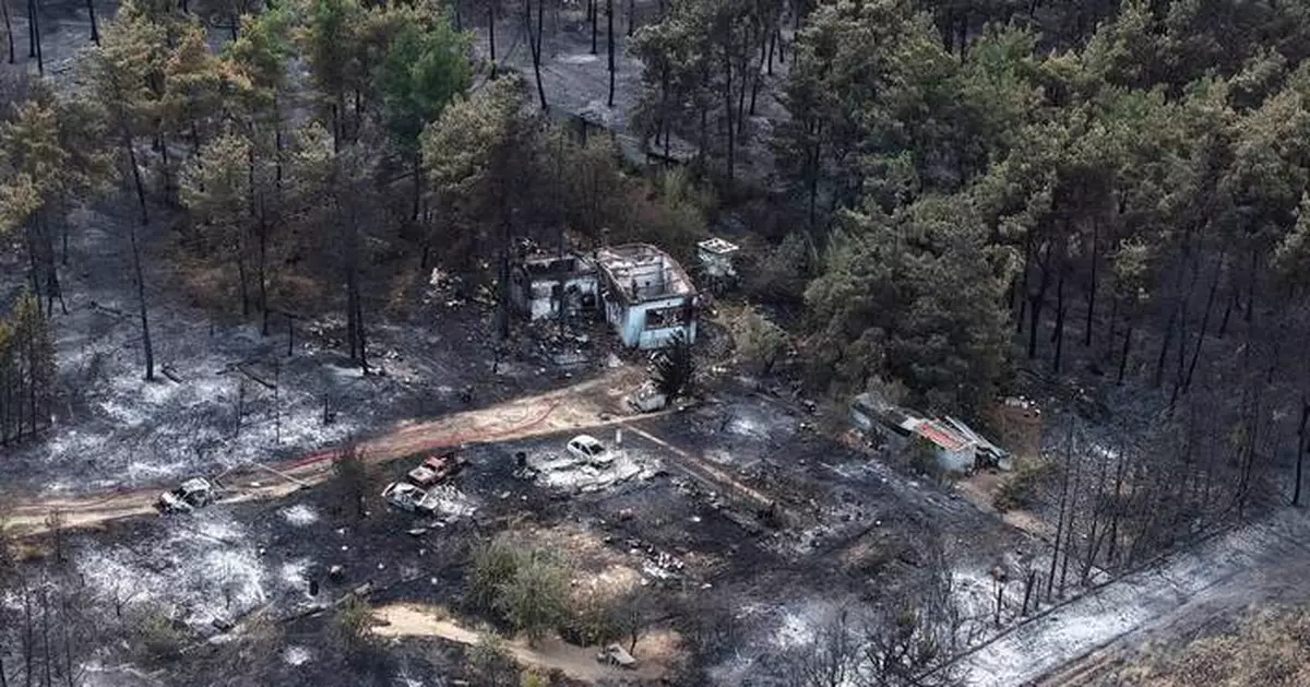 Wildfires kill a father and son in Greece and prompt evacuations in 2 villages