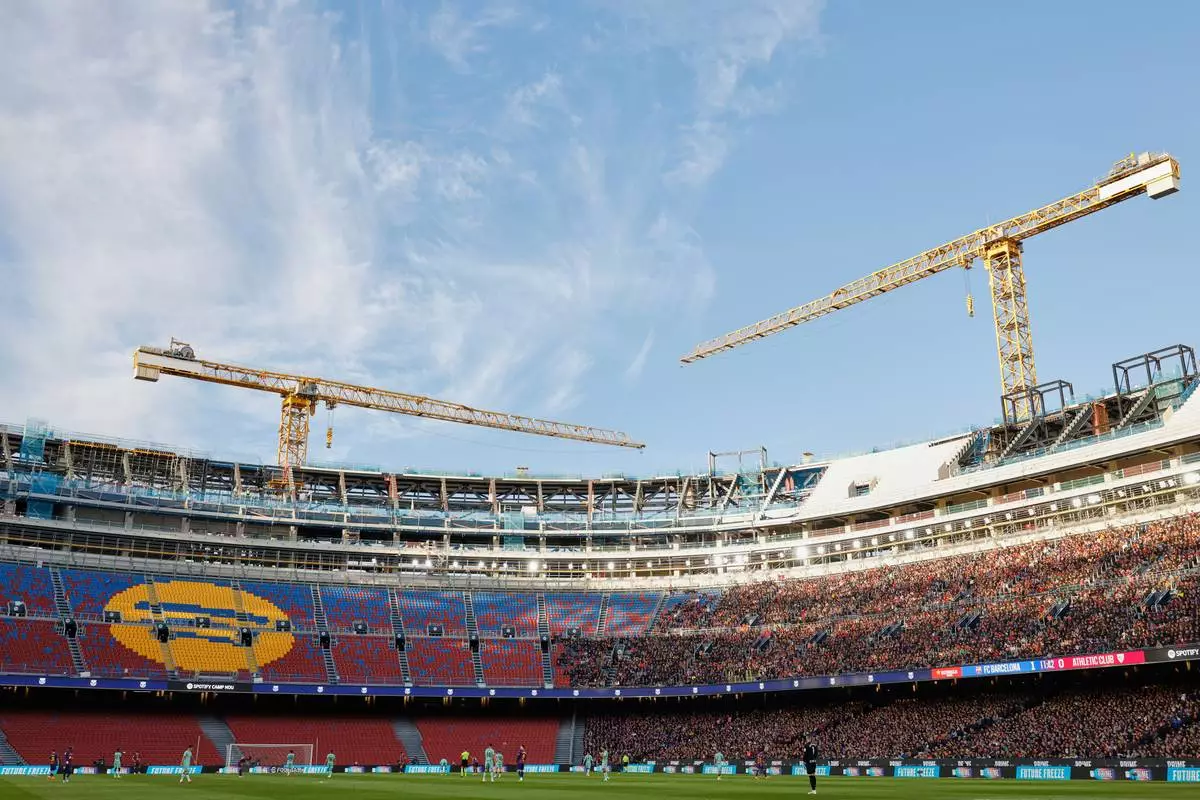 FILE - Camp Nou stadium under renavation work is see during a La Liga soccer match between Barcelona and Athletic in Barcelona, Spain, Saturday, Nov. 22, 2025. AP Photo/Joan Monfort, file)