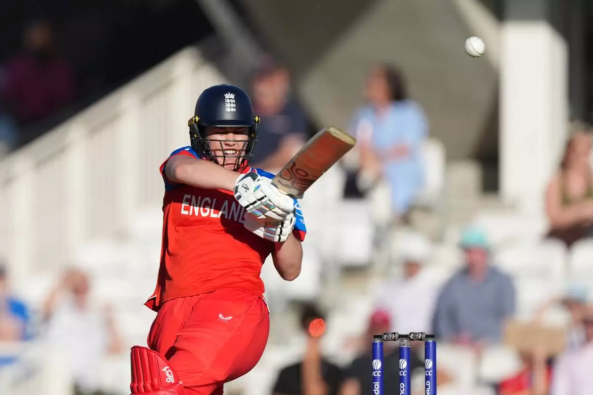 England's Natalie Sciver-Brunt plays a shot during the Women's T20 Cricket World Cup semifinal match between England and South Africa in London, Thursday, July 2, 2026. (AP Photo/Alastair Grant)