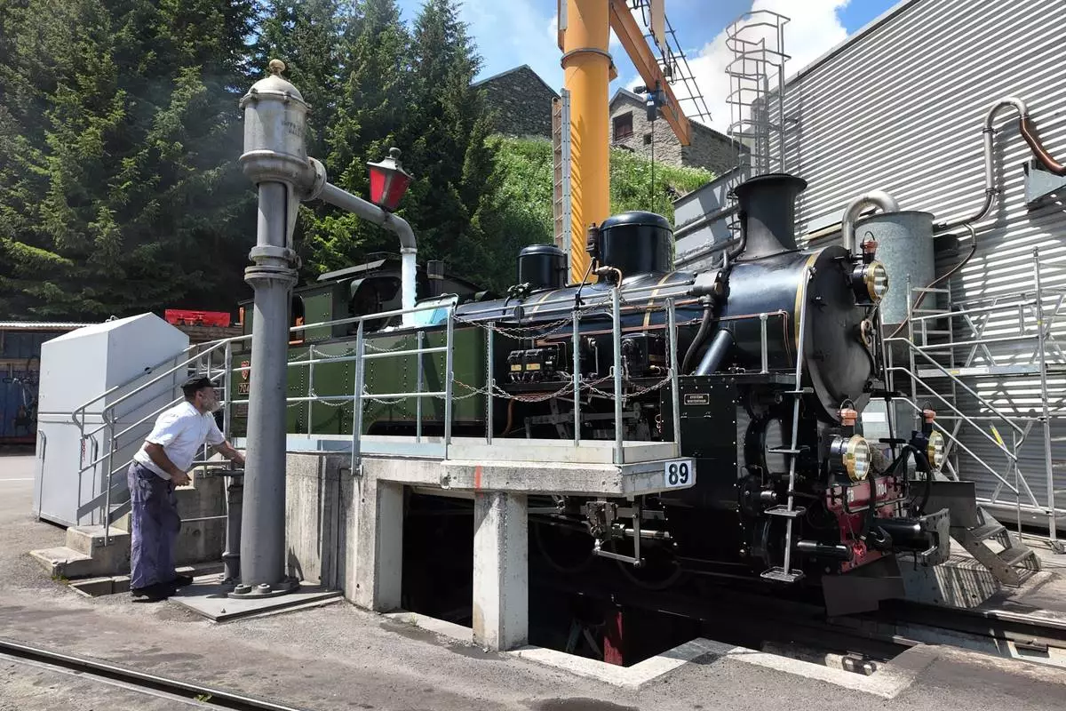 Bernhard Lang, volunteer train driver, prepares a steam locomotive at the DFB (Dampfbahn Furka‑Bergstrecke) depot in Realp, Switzerland, Friday, June 26, 2026. (AP Photo/Niccolo Lupone)