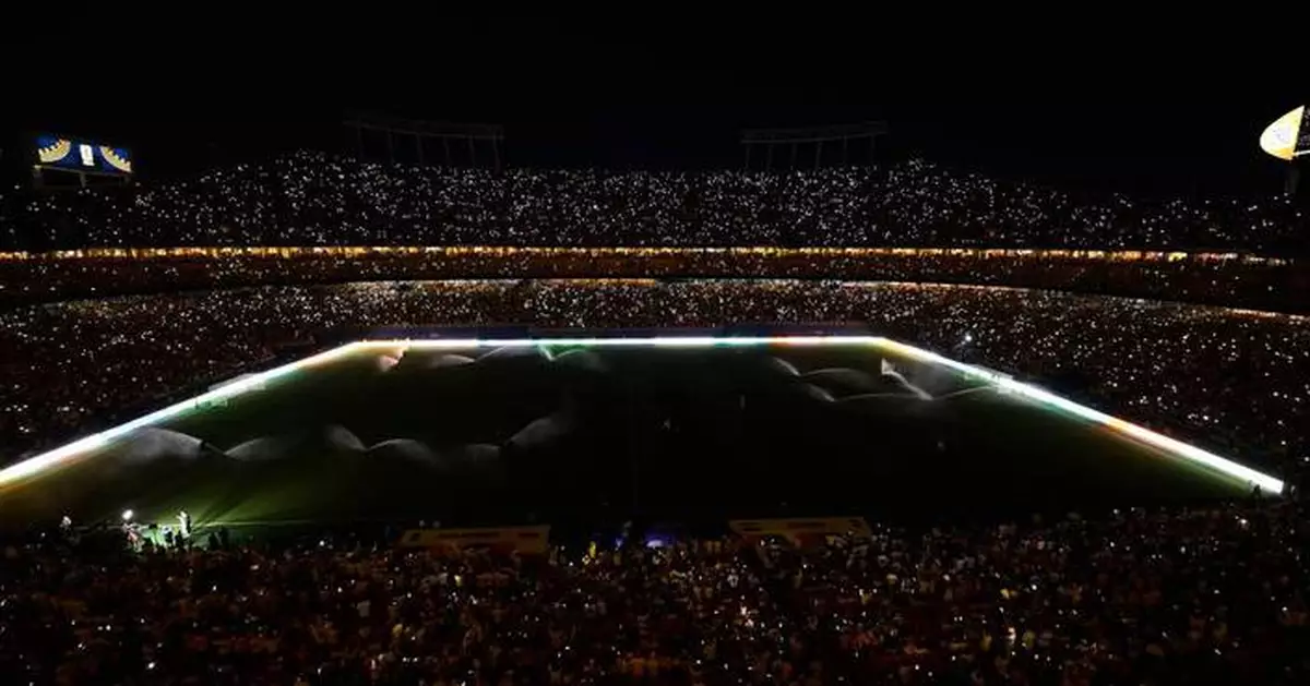 One Extraordinary Photo: A stadium lit up by smartphones